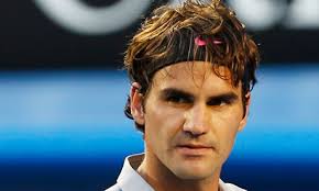 Roger Federer beat Bernard Tomic Federer 6-4, 7-6, 6-1 in the third round of the Australian Open at Melbourne Park. Photograph: Mast Irham/EPA - Roger-Federer-pumps-his-f-010