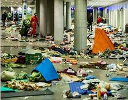Image result for Photographs of the refugees trashing the streets of Paris
