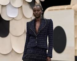 Image of Chanel tweed suit