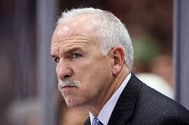 Dec 14, 2011; St. Paul, MN, USA; Chicago Blackhawks head coach Joel Quenneville during the second period against the Minnesota Wild at the Xcel Energy ... - 5800930
