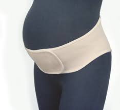 women with a pregnancy belt