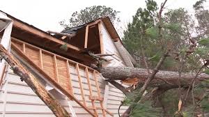 Family of 8 searching for new home after storm destroys Austell house