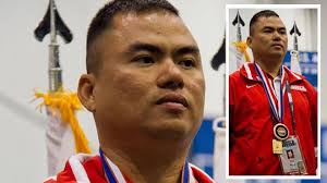 Sgt. Than Naing after winning a medal for an archery competition during the 2012 Warrior games.USMC. Before 9/11, Burma native Than Naing served fast food. - SgtNaingmedal