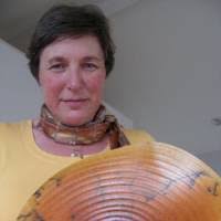 Swanica Ligtenberg holds a plate titled &#39;Circles of Life&#39; at her studio in ... - fl20100501a1a-200x200