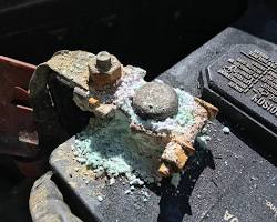 car battery with corrosion on the terminals