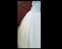 صورة فستان زفاف مستورد