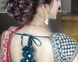 Image of Sleek and Chic Updo hairstyle for saree