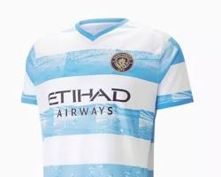 Image of Manchester City's white and blue jersey