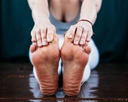 woman stretching feet