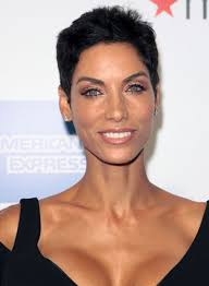 Nicole Murphy&#39;s piece-y pixie looks so edgy. Steal her style: 1. Apply texturizing product to damp hair and allow it to air dry. - nicole-murphy-short-updo-black