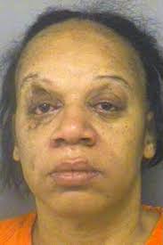A judge set $500,000 bond Friday for Cheryl White of Battle Creek. Police say she stabbed 63-year-old Thomas Blige in the neck Thursday ... - cheryl-white-booking