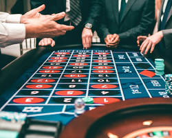 Gemdisco Casino table games at night