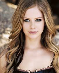 Avril Lavigne  - 2022 Dyed hair & beachy hair style.
