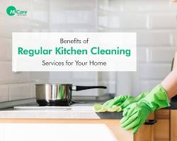 Residential cleaners cleaning a kitchen