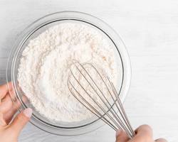 Gambar In a separate bowl, whisk together the flour, baking soda, and salt