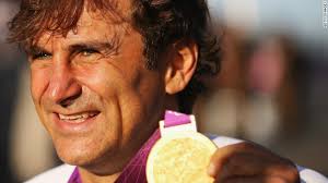 Alex Zanardi proudly displays the gold medal he won at the 2012 London Paralympics in the Individual H4 Time Trial. - 120905074835-zanardi1-horizontal-gallery
