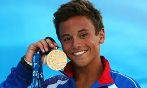 Tom Daley last night became Britain&#39;s first individual world diving champion after taking gold in the 10m platform event. The 15-year-old was fourth with ... - Tom-Daley-with-gold-medal-001