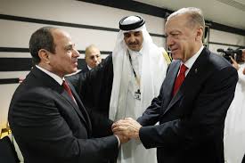 Erdogan-Sisi handshake sparks backlash from Turkey's Islamists