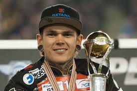 Tai Woffinden with his trophy in Poland [EPA]. Woffinden claimed the six points he needed on Saturday night to become Britain&#39;s first winner since Mark ... - 34204