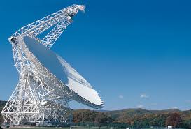 FRB 121102: Radio Calling Cards from a Distant Civilization?