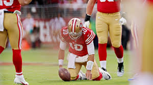 49ers' Jimmy Garoppolo carted off in first quarter vs. Dolphins with ankle 
injury; rookie Brock Purdy steps in