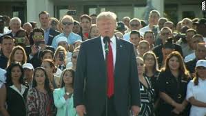 Image result for Trump rushed off stage at campaign rally; protester says he was roughed up