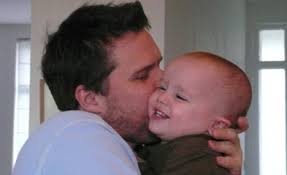 Philip Robinson embraces his son Oscar, despite finding it hard to love his baby in the initial stages of fatherhood. The truth was that when I looked at ... - article-1285056-09C28B4E000005DC-472_468x286