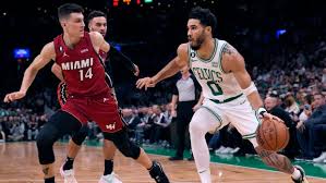 Tatum scores 49, Celtics hold off hot-shooting Heat 134-121