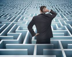 Image of person looking lost in a maze