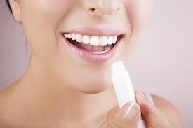 Image result for girl putting on chapstick