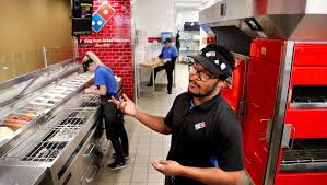 Domino's Pizza implements new features, young leadership