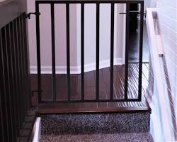 Image of modern baby safety gates in wood and metal