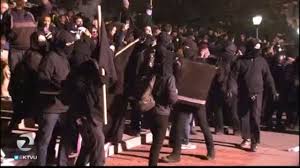 Image result for berkeley protesters dressed in black