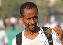 Ethopian runner Tesfaye Girma looks on after his participation in the. - 107781748-ethopian-runner-tesfaye-girma-looks-on-after-gettyimages