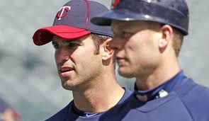 Letting Justin Morneau, right with Joe Mauer, walk for nothing as a free agent in 15 months would be a missed opportunity. - MauerMorneau640_0