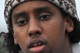 Mohammed Ahmed Mohamed, 27, escaped surveillance by wearing a burka. Home Secretary Theresa May is under mounting pressure to explain how a terror suspect ... - Mohammed-Ahmed-Mohamed