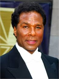 Philip Michael Thomas appeared opposite fellow actor Don Johnson as Ricardo Tubbs. Thomas and Johnson co-starred on this popular show from 1984 to 1990. - philip-michael-thomas-miami-vice-now-2-768
