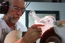Waterford crystal cutting. And no, there isn&#39;t a seconds store. 25% of the day&#39;s blown glass gets recycled because of impurities. Any “seconds” will be fake ... - Ireland-roadie-cutting-crystal