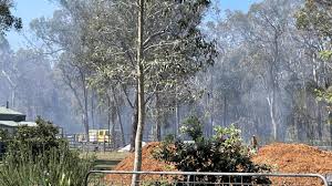 New Qld fire threat as bush blaze burns near homes