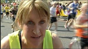 Novice runner BBC Look East presenter Amelia Reynolds battled with the &quot;mental&quot; weather to complete the 2009 London Marathon. - _45705903_marathon_amelia