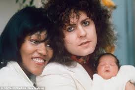 Happy families: Rolan as a baby with his parents Marc Bolan and Gloria Jones - article-2025138-0D61809D00000578-333_634x422