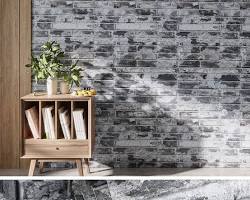 Image of Industrial living room with brick wallpaper and vintage furniture