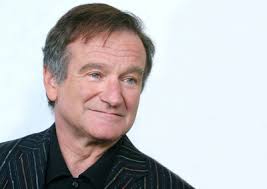 Robin Williams ha un sorriso particolare che ha caratterizzato il suo personaggio Mork, labbra sottili e occhi chiari sono perennemente nell'espressione di stupore felicità