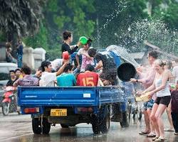 Lao Water Festival with people splashing water on each other