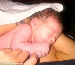 Cassius Joseph Barton... QPR star Joey becomes father for the first time - article-2079292-0F499A9200000578-827_468x408