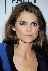 Adding a bit of flare is the hint of electric blue on Russell&#39;s eyes which complements the jacket without coming across as too matchy matchy. - keri-russell-electric-blue-eyes