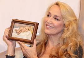 Jerry Hall poses holding Lucian Freud&#39;s &#39;Eight Months Gone&#39; at Sotherbys on October 7, 2010 in London, England. Selected artworks from Jerry Hall&#39;s ... - Jerry%2BHall%2BJerry%2BHall%2BArtwork%2BCollection%2BPhotocall%2BkGjcMzPYn73l