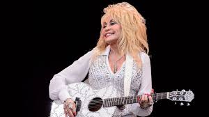 Image result for Dolly Parton: 'Heartbroken' over fire destruction as Dollywood is spared