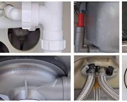 Image of Leaky pipes under a kitchen sink