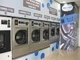 Maytag Commercial Laundry Abrir una lavandera con monedas